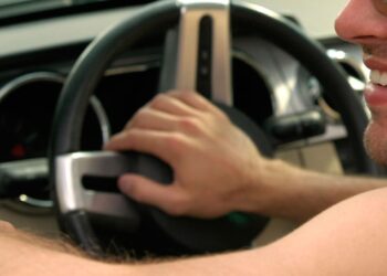 Naked driver faces fine for “non essential” journey