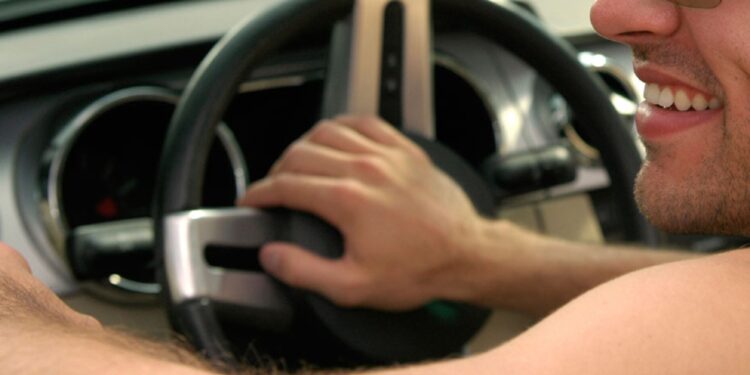 Naked driver faces fine for “non essential” journey