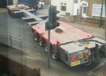 Massive transporter gets stuck leaving Grimsby after delivering new bridge