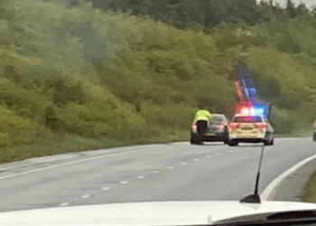 Policeman Pushes Stranded Motorist Over 1 Mile In Pouring Rain After Recovery Company ‘Refused To Stop’
