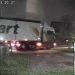 Truck rams house