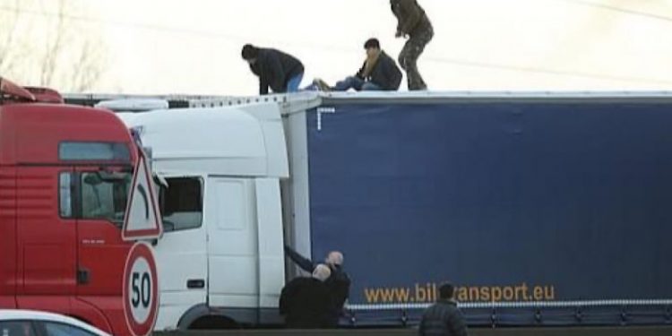 Trucker dies after migrant attack