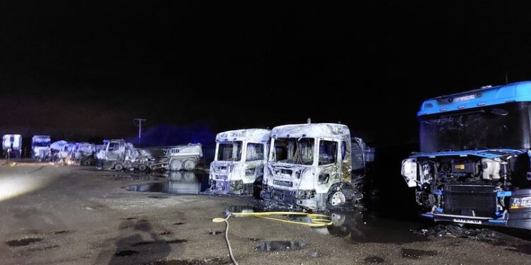Trucks destroyed as firefighters called to ‘explosions’