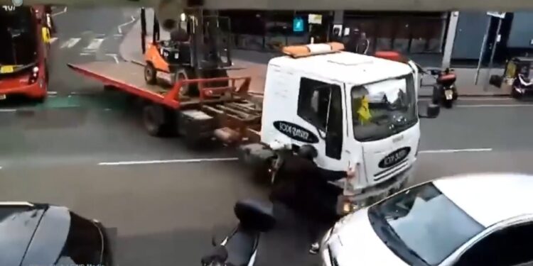 Video oops | Truck rolls into bus